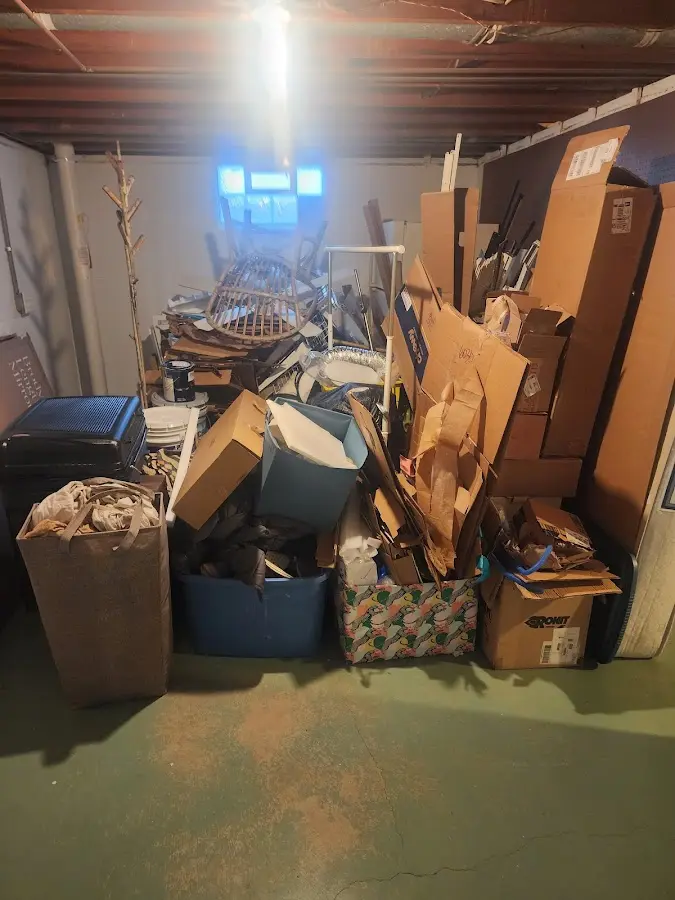 Roll-off dumpster container at job site for 15 Yard Dumpster Rental in Dickinson